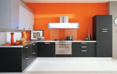 Wooden Modular Kitchen by Saffron Interiors & Engineering
