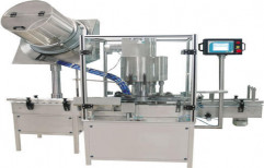 Automatic Screw Cap Sealing Machine by Rattan Industrial India Pvt. Ltd.
