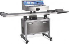 Continuous Induction Sealer by Surya Packaging