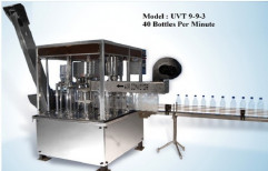 Automatic Bottle Filling Machine UVT 9-9-3 40BPM by U. V. Tech Systems