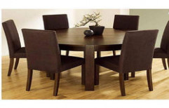 Wooden Dining Table by Metro Interior Decorators