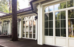 Windows and Doors with natural wood frames by EWG - Exclusive Windows Group