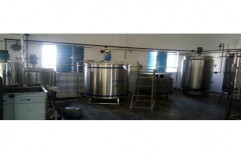 Glass Bottle Filling Machine by U.G. Bottling Systems