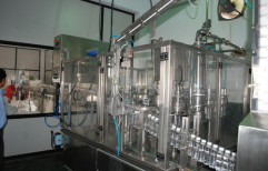Automatic Bottle Rinsing, Filling Machine by Unitech Water Solution