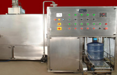 Automatic Bubble Top Filling Machine by Canadian Crystalline Water India Limited